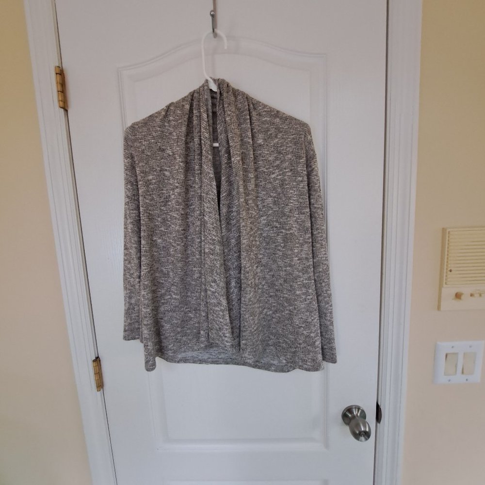 Size Small Open Cardigan Gold threads weaved throughout pretty young thing